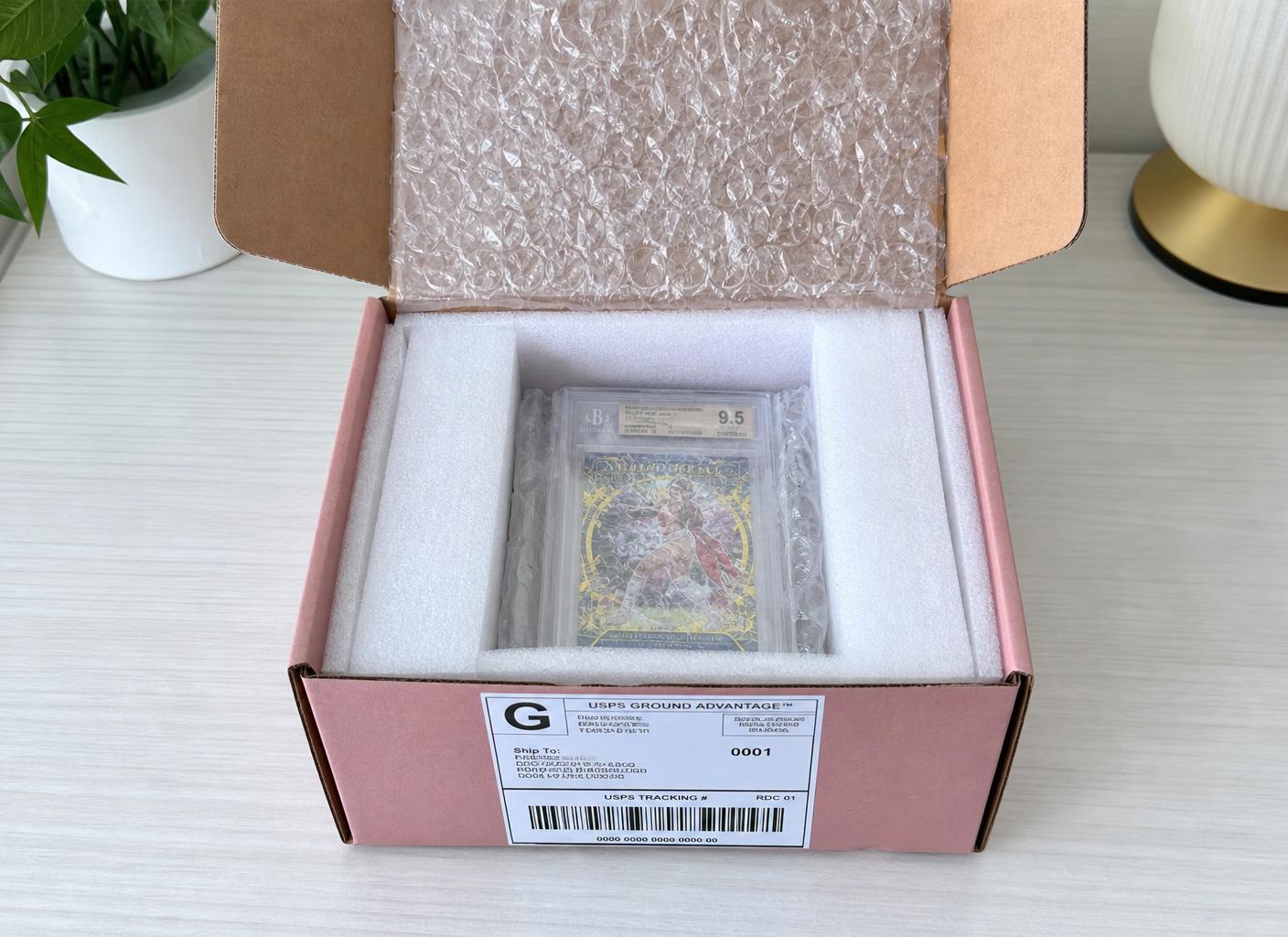Protective packaging and mailing box prepared for a graded card